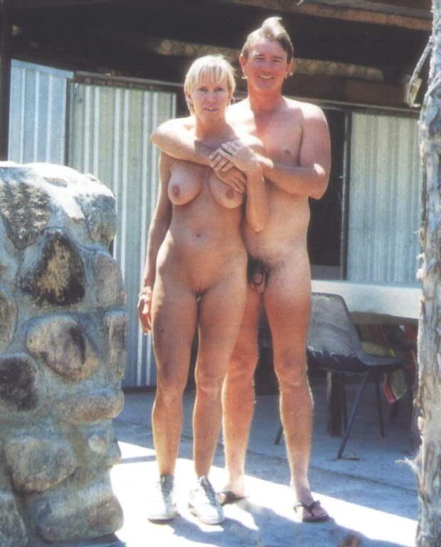 Our vacation photo showing my wifes huge saggy tits with big nipples and shaved pussy with my tiny unucut hairy cock with big balls image